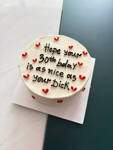 Кръгла бяла торта с надпис 'Hope your 30th bday is as nice as your Dick'