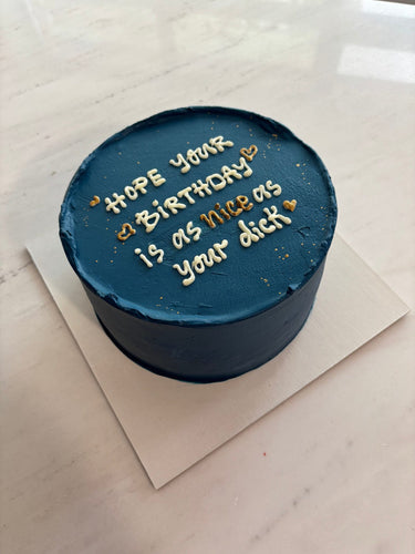 Кръгла морскосиня торта с брокат и златен надпис 'Hope your Birthday is as nice as your dick'.