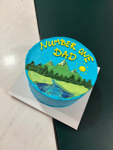 Кръгла синя торта с рисунка и надпис NUMBER ONE DAD
