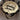Кръгла бяла торта с надпис Birthday Queen, украсена с панделки и кремав кант.