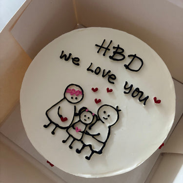 Кръгла бяла торта с рисунка и надпис 'HBD we love you'.